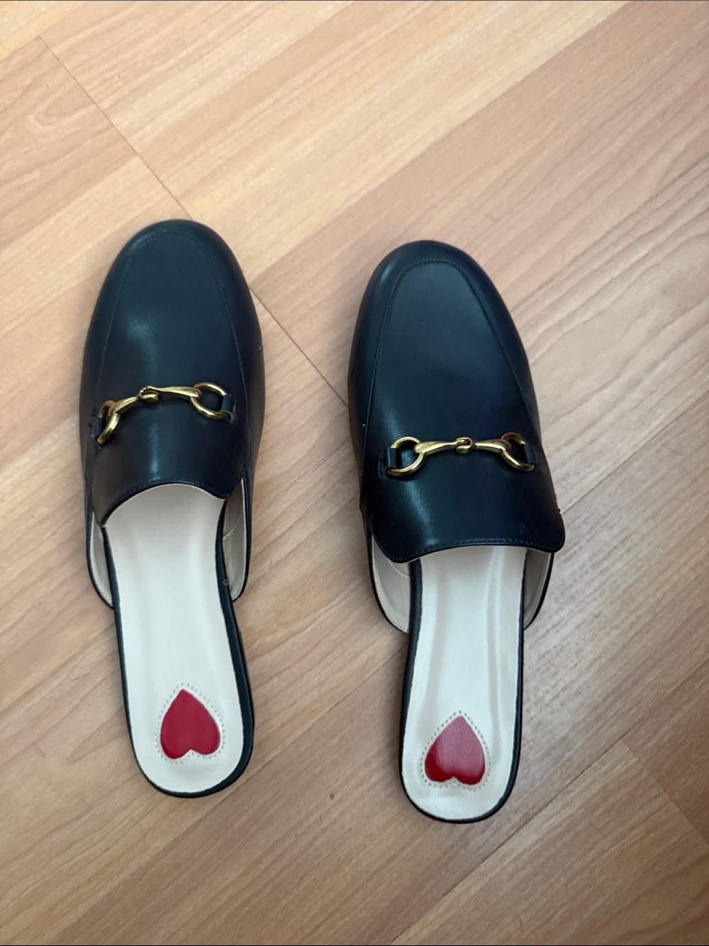Black Leather Horsebit Mules with Gold Hardware